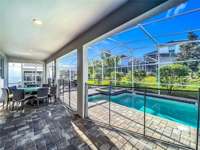 WALKING DISTANCE TO THE CLUBHOUSE. This beautifully designed on The Oasis Club at Champions Gate in Florida - for sale on GolfHomes.com, golf home, golf lot