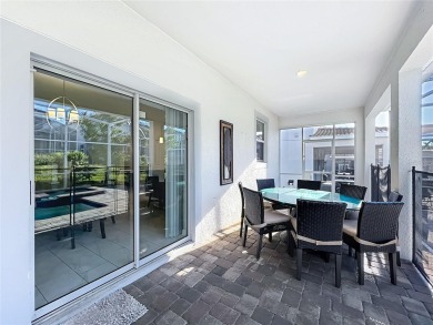 WALKING DISTANCE TO THE CLUBHOUSE. This beautifully designed on The Oasis Club at Champions Gate in Florida - for sale on GolfHomes.com, golf home, golf lot