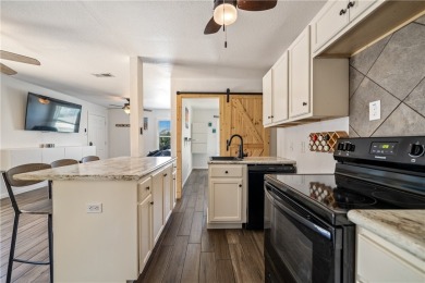 Enjoy island living in this beautifully updated 2 bedroom, 1 on Palmilla Beach Golf Club in Texas - for sale on GolfHomes.com, golf home, golf lot