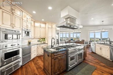 Located in the golf course community of Kings Deer, this on Kings Deer Golf Club in Colorado - for sale on GolfHomes.com, golf home, golf lot