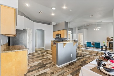 Enjoy one of the best locations on the lake with wide, panoramic on Los Lagos Golf Club in Arizona - for sale on GolfHomes.com, golf home, golf lot