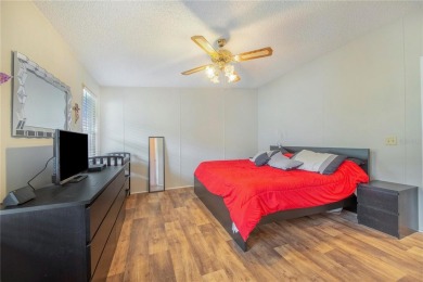 Welcome to effortless living in this charming 2-bedroom, 2-bath on Sweetwater Golf and Tennis Club in Florida - for sale on GolfHomes.com, golf home, golf lot
