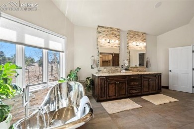 Located in the golf course community of Kings Deer, this on Kings Deer Golf Club in Colorado - for sale on GolfHomes.com, golf home, golf lot