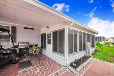 Welcome to effortless living in this charming 2-bedroom, 2-bath on Sweetwater Golf and Tennis Club in Florida - for sale on GolfHomes.com, golf home, golf lot