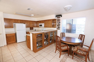Discover easy desert living in this well-kept 2-bedroom, 2-bath on Foothills Executive Golf Course in Arizona - for sale on GolfHomes.com, golf home, golf lot