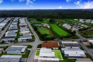Welcome to effortless living in this charming 2-bedroom, 2-bath on Sweetwater Golf and Tennis Club in Florida - for sale on GolfHomes.com, golf home, golf lot