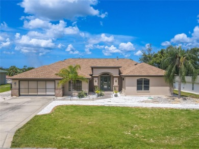 Welcome to this exceptional custom-built Alexander home on Oak Hills Country Club in Florida - for sale on GolfHomes.com, golf home, golf lot