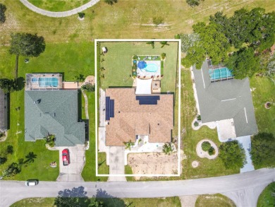 Welcome to this exceptional custom-built Alexander home on Oak Hills Country Club in Florida - for sale on GolfHomes.com, golf home, golf lot