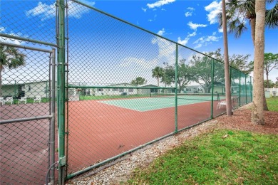 Welcome to effortless living in this charming 2-bedroom, 2-bath on Sweetwater Golf and Tennis Club in Florida - for sale on GolfHomes.com, golf home, golf lot