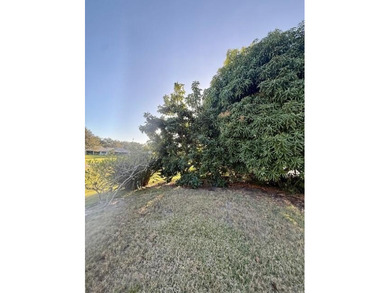 Beautifully maintained cul-de-sac home with peaceful woods and on Eagle Wood Golf Course in Florida - for sale on GolfHomes.com, golf home, golf lot