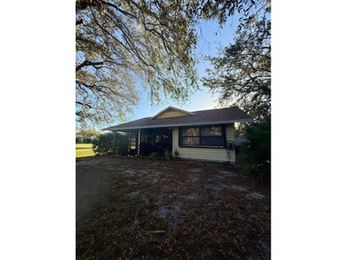 Beautifully maintained cul-de-sac home with peaceful woods and on Eagle Wood Golf Course in Florida - for sale on GolfHomes.com, golf home, golf lot