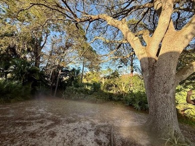 Beautifully maintained cul-de-sac home with peaceful woods and on Eagle Wood Golf Course in Florida - for sale on GolfHomes.com, golf home, golf lot