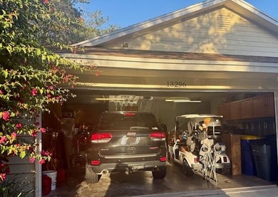 Beautifully maintained cul-de-sac home with peaceful woods and on Eagle Wood Golf Course in Florida - for sale on GolfHomes.com, golf home, golf lot