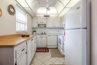 Clean and bright 2nd-floor corner unit. Updated baths, tiled on Kings Point Golf - Executive in Florida - for sale on GolfHomes.com, golf home, golf lot