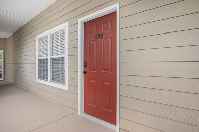 Enjoy low-maintenance living in this furnished second-floor unit on Kingwood Golf Club and Resort in Georgia - for sale on GolfHomes.com, golf home, golf lot