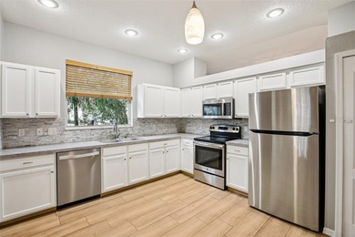 An EXCEPTIONAL VALUE in one of New Tampa's most sought-after on Hunters Green Country Club in Florida - for sale on GolfHomes.com, golf home, golf lot