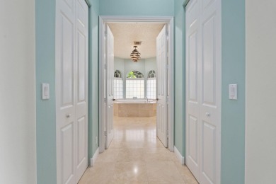 Welcome to this exquisite, move-in ready, custom-built courtyard on The Cape Club of Palm City in Florida - for sale on GolfHomes.com, golf home, golf lot
