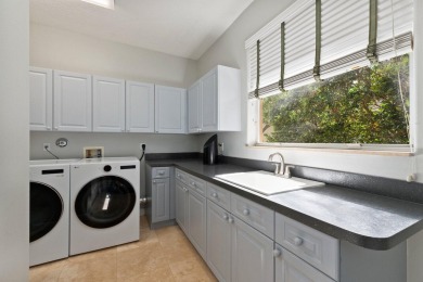 Welcome to this exquisite, move-in ready, custom-built courtyard on The Cape Club of Palm City in Florida - for sale on GolfHomes.com, golf home, golf lot