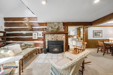 Beautiful lakefront log home located at Crooked Lake. This 4 on Crooked Lake Golf Course Whitley County in Indiana - for sale on GolfHomes.com, golf home, golf lot