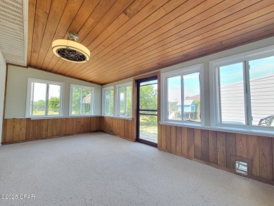 Welcome Home!! This Beach Bungalow has everything you need! on Holiday Golf Club in Florida - for sale on GolfHomes.com, golf home, golf lot