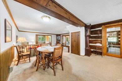Beautiful lakefront log home located at Crooked Lake. This 4 on Crooked Lake Golf Course Whitley County in Indiana - for sale on GolfHomes.com, golf home, golf lot
