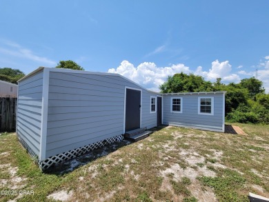 Welcome Home!! This Beach Bungalow has everything you need! on Holiday Golf Club in Florida - for sale on GolfHomes.com, golf home, golf lot