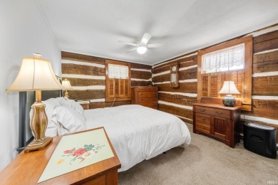Beautiful lakefront log home located at Crooked Lake. This 4 on Crooked Lake Golf Course Whitley County in Indiana - for sale on GolfHomes.com, golf home, golf lot