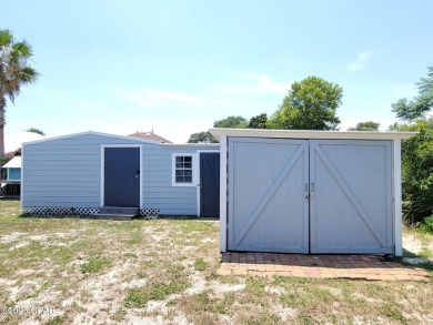 Welcome Home!! This Beach Bungalow has everything you need! on Holiday Golf Club in Florida - for sale on GolfHomes.com, golf home, golf lot