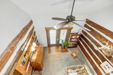 Beautiful lakefront log home located at Crooked Lake. This 4 on Crooked Lake Golf Course Whitley County in Indiana - for sale on GolfHomes.com, golf home, golf lot