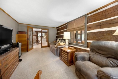 Beautiful lakefront log home located at Crooked Lake. This 4 on Crooked Lake Golf Course Whitley County in Indiana - for sale on GolfHomes.com, golf home, golf lot