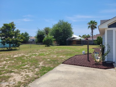 Welcome Home!! This Beach Bungalow has everything you need! on Holiday Golf Club in Florida - for sale on GolfHomes.com, golf home, golf lot