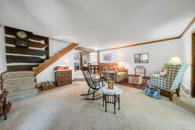 Beautiful lakefront log home located at Crooked Lake. This 4 on Crooked Lake Golf Course Whitley County in Indiana - for sale on GolfHomes.com, golf home, golf lot