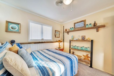 INCREDIBLE WATERFRONT WONDERLAND in Captain's Cove Golf & Yacht on Captains Cove Golf and Yacht Club in Virginia - for sale on GolfHomes.com, golf home, golf lot