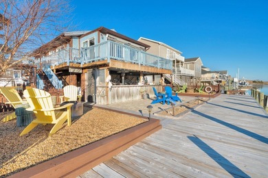 INCREDIBLE WATERFRONT WONDERLAND in Captain's Cove Golf & Yacht on Captains Cove Golf and Yacht Club in Virginia - for sale on GolfHomes.com, golf home, golf lot