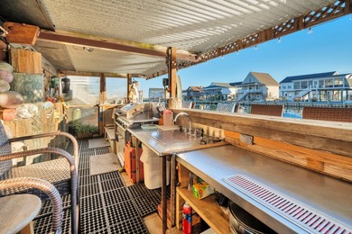 INCREDIBLE WATERFRONT WONDERLAND in Captain's Cove Golf & Yacht on Captains Cove Golf and Yacht Club in Virginia - for sale on GolfHomes.com, golf home, golf lot