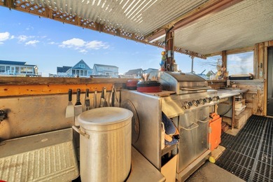 INCREDIBLE WATERFRONT WONDERLAND in Captain's Cove Golf & Yacht on Captains Cove Golf and Yacht Club in Virginia - for sale on GolfHomes.com, golf home, golf lot