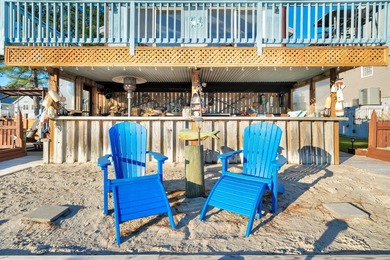 INCREDIBLE WATERFRONT WONDERLAND in Captain's Cove Golf & Yacht on Captains Cove Golf and Yacht Club in Virginia - for sale on GolfHomes.com, golf home, golf lot