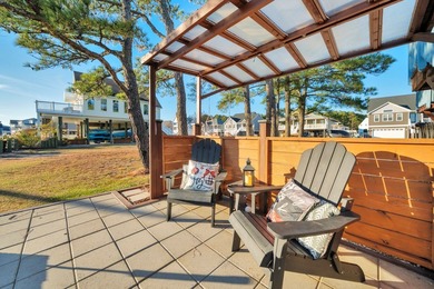 INCREDIBLE WATERFRONT WONDERLAND in Captain's Cove Golf & Yacht on Captains Cove Golf and Yacht Club in Virginia - for sale on GolfHomes.com, golf home, golf lot