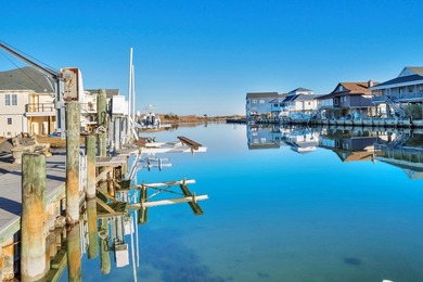 INCREDIBLE WATERFRONT WONDERLAND in Captain's Cove Golf & Yacht on Captains Cove Golf and Yacht Club in Virginia - for sale on GolfHomes.com, golf home, golf lot