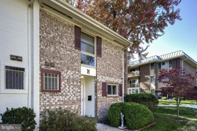 This coveted brick end-unit townhouse with two bedrooms, one on Leisure World Golf Club in Maryland - for sale on GolfHomes.com, golf home, golf lot