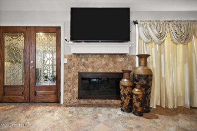 This beautifully maintained 4-bedroom, 2-bath gem nestled in the on Annandale Golf Club in Mississippi - for sale on GolfHomes.com, golf home, golf lot