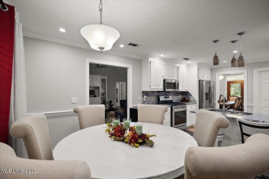 This beautifully maintained 4-bedroom, 2-bath gem nestled in the on Annandale Golf Club in Mississippi - for sale on GolfHomes.com, golf home, golf lot