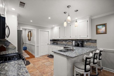 This beautifully maintained 4-bedroom, 2-bath gem nestled in the on Annandale Golf Club in Mississippi - for sale on GolfHomes.com, golf home, golf lot