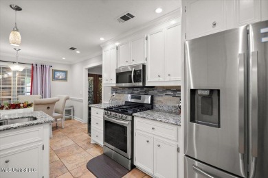 This beautifully maintained 4-bedroom, 2-bath gem nestled in the on Annandale Golf Club in Mississippi - for sale on GolfHomes.com, golf home, golf lot