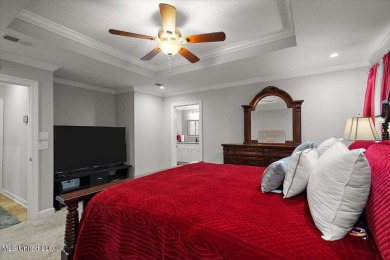 This beautifully maintained 4-bedroom, 2-bath gem nestled in the on Annandale Golf Club in Mississippi - for sale on GolfHomes.com, golf home, golf lot