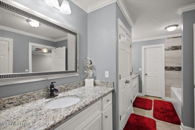 This beautifully maintained 4-bedroom, 2-bath gem nestled in the on Annandale Golf Club in Mississippi - for sale on GolfHomes.com, golf home, golf lot