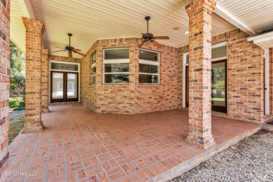 A DREAM COME TRUE - CUSTOM BUILT HOME ON TWO LOTS (3RD LOT CAN on Diamondhead Country Club in Mississippi - for sale on GolfHomes.com, golf home, golf lot
