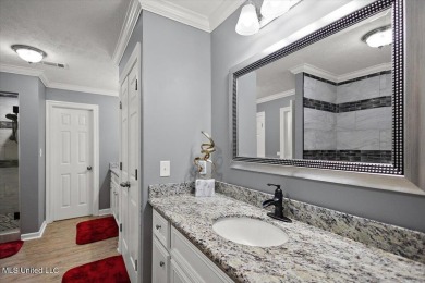 This beautifully maintained 4-bedroom, 2-bath gem nestled in the on Annandale Golf Club in Mississippi - for sale on GolfHomes.com, golf home, golf lot