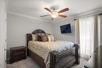 This beautifully maintained 4-bedroom, 2-bath gem nestled in the on Annandale Golf Club in Mississippi - for sale on GolfHomes.com, golf home, golf lot