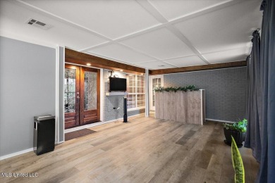 This beautifully maintained 4-bedroom, 2-bath gem nestled in the on Annandale Golf Club in Mississippi - for sale on GolfHomes.com, golf home, golf lot